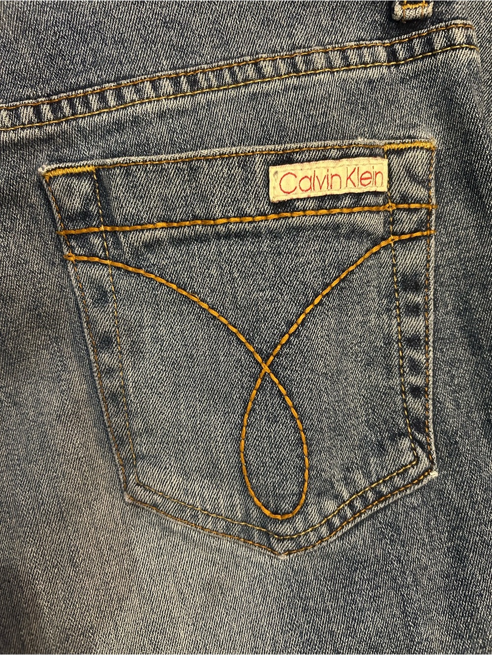 Calvin Klein Women's Light Blue Straight-Leg Jeans with Yellow Stitching